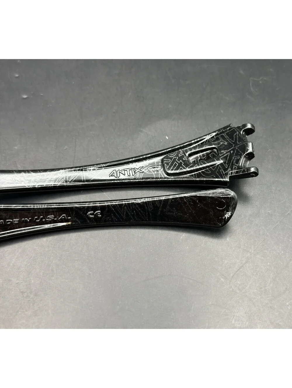 Oakley Antix Polished Black History Text OEM Replacement Arms